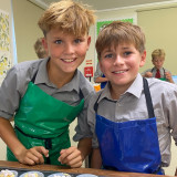pupils baking cupcakes