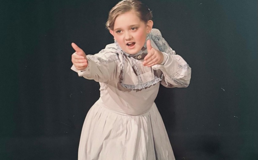 Pupil on stage dancing