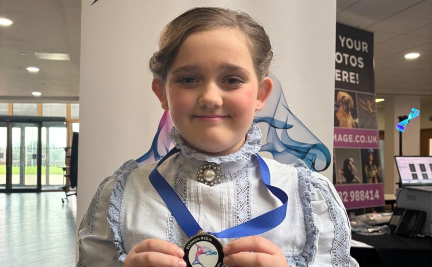 Pupil with gold medal