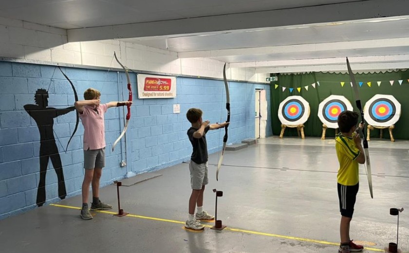 children doing archery