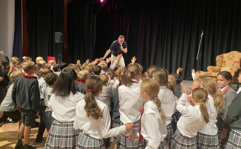 Sammy Angelo singing on stage