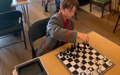 boy playing chess